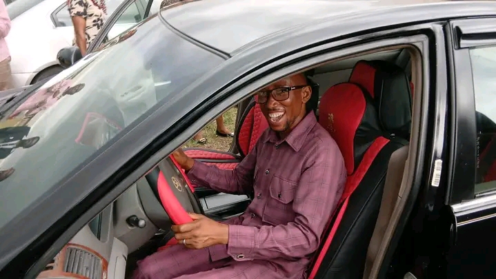A beneficiary of the Vision Foundation EduConsult empowerment initiative behind the wheel of his new car