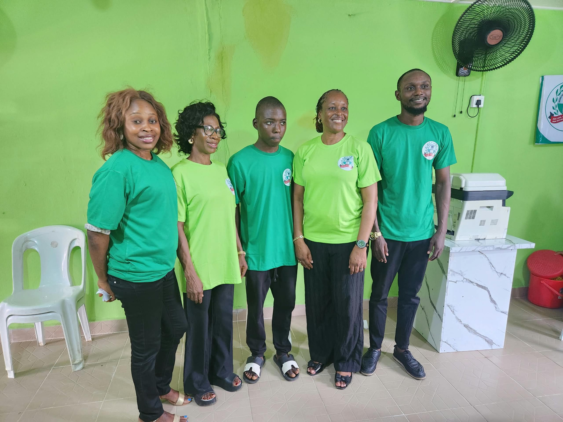 Vision Foundation EduConsult members posing together at the Eket office opening